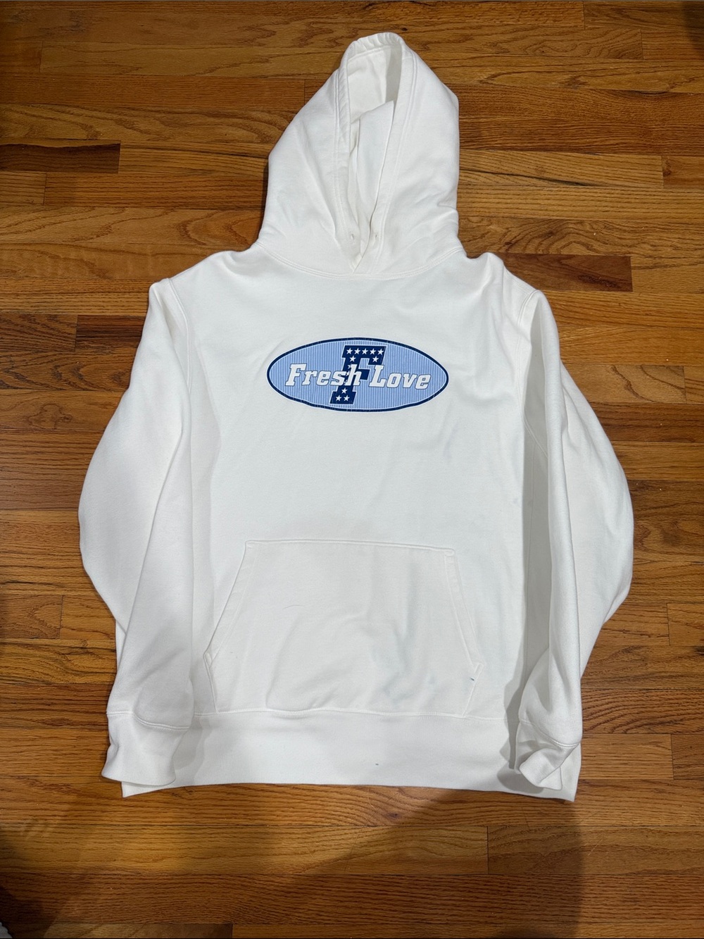 Fresh Love White Graphic Hoodie

Little blue stain
